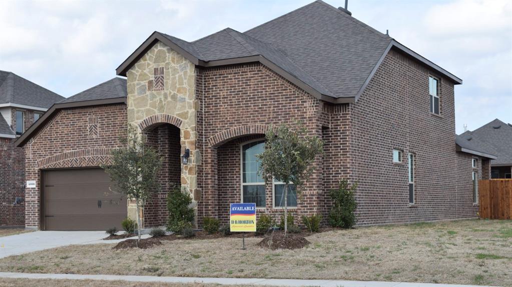 4000 Windhaven Drive Forney, TX 75126 - Photo 1 of 1 a front view of a house with garden