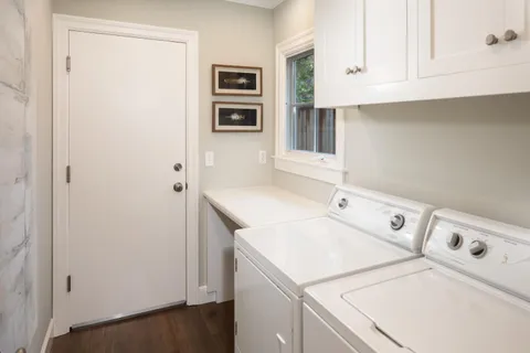 a utility room with dryer and washer