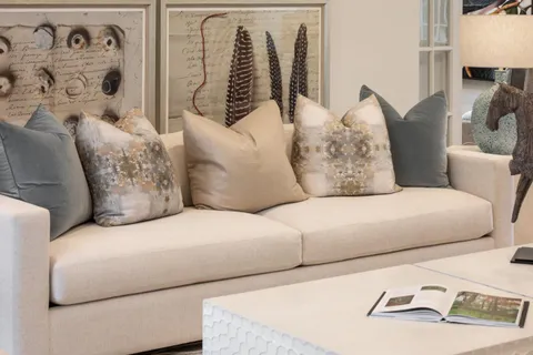 a living room with furniture and a couch