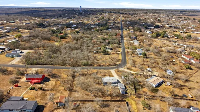 a view of a house with a big yard