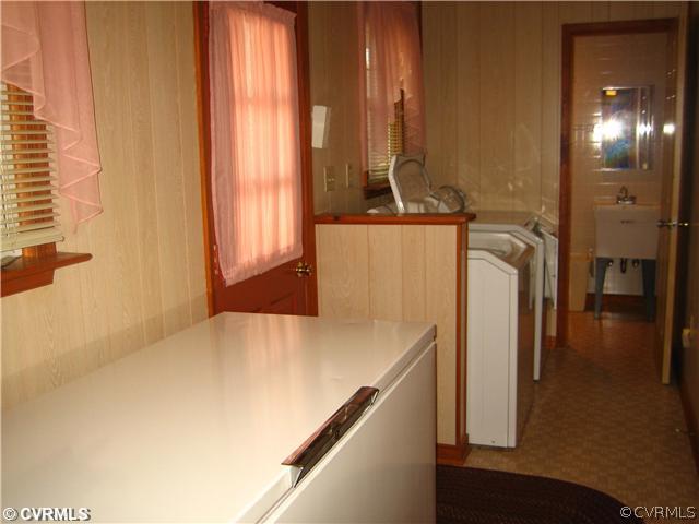 2347 Danieltown Road Goochland, VA 23063 - Photo 7 of 12 a kitchen with a refrigerator and countertop