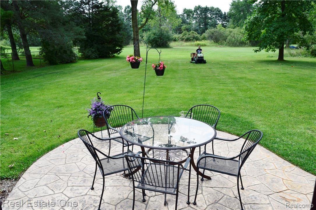 3979 West Maple Road Wixom, MI 48393 - Photo 16 of 18 Poured Concrete Patio.JPG