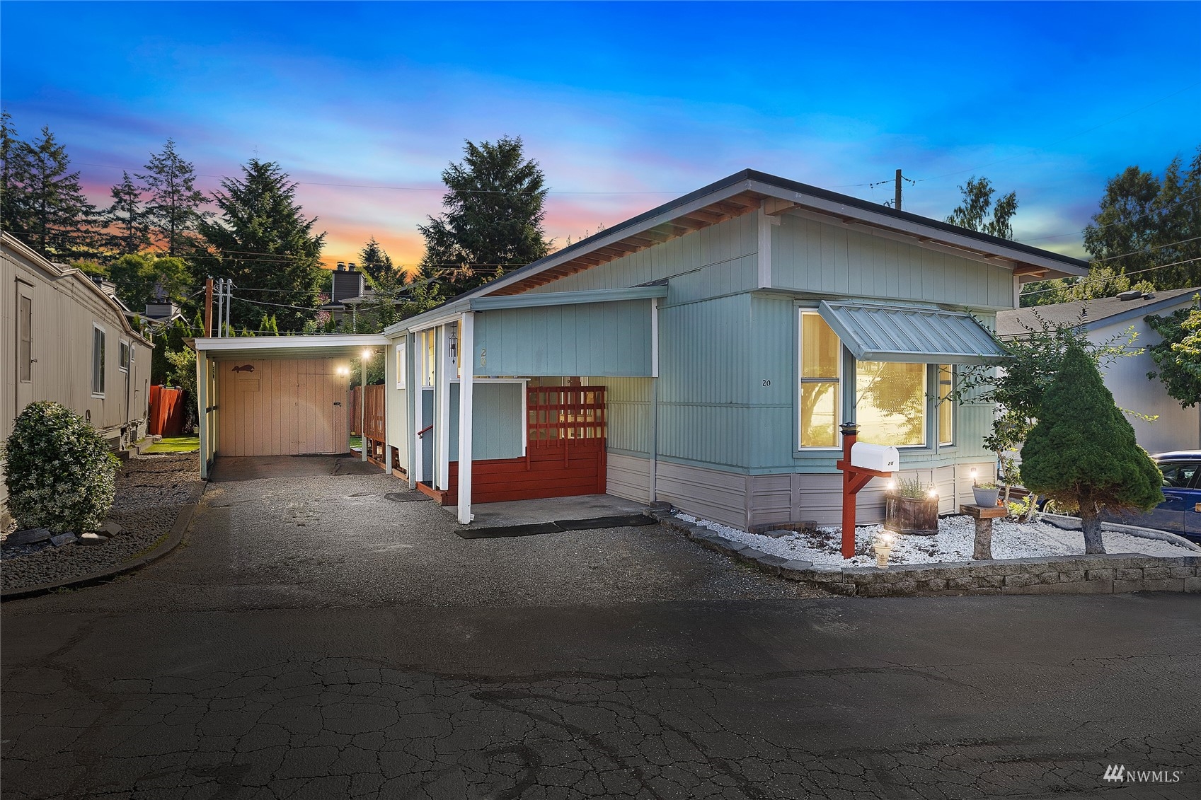 7311 Chambers Creek Road West, Unit 20 University Place, WA 98467 - Photo 1 of 23 a view of a house with outdoor space and tree s