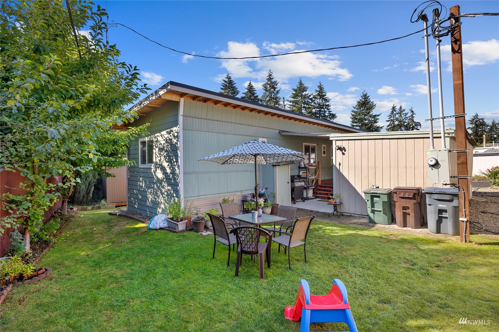 7311 Chambers Creek Road West, Unit 20 University Place, WA 98467 - Photo 7 of 23 a view of a house with backyard