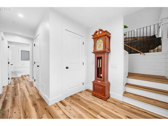 a view of entryway with wooden floor