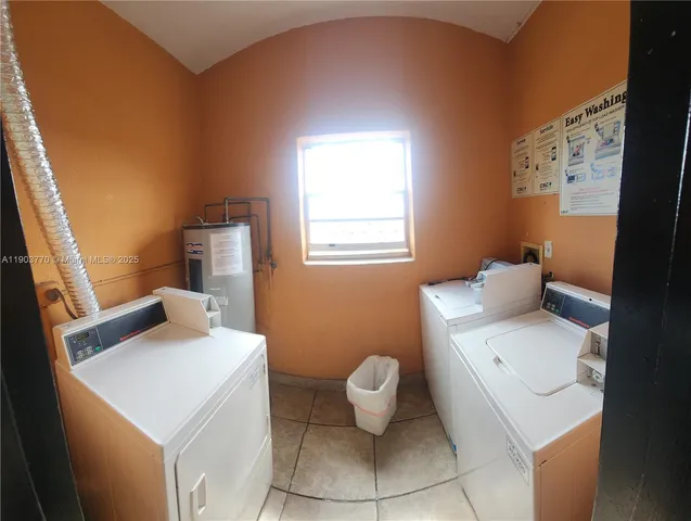 a bathroom with a sink toilet and window