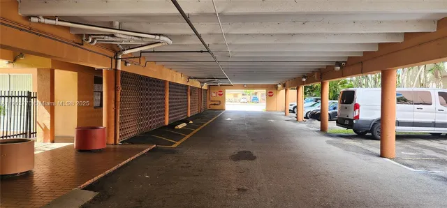 a view of a room with wooden walls