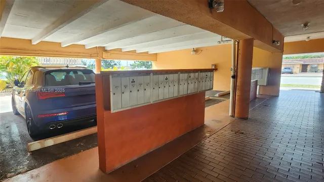 a view of a porch with wooden floor