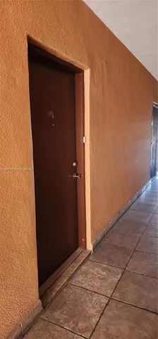 an empty room with door