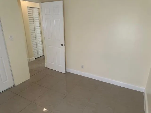 an empty room with a natural light