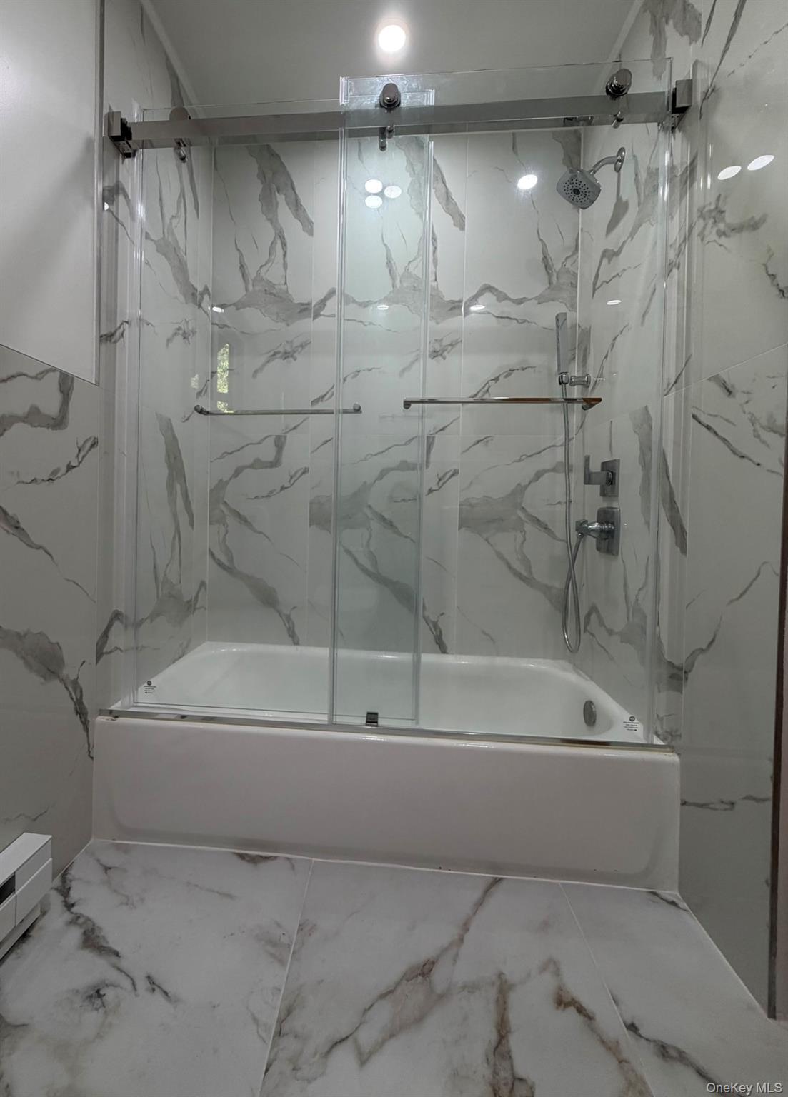 60 Medallion Road Kiamesha Lake, NY 12751 - Photo 29 of 44 a bathroom with a bathtub and a shower