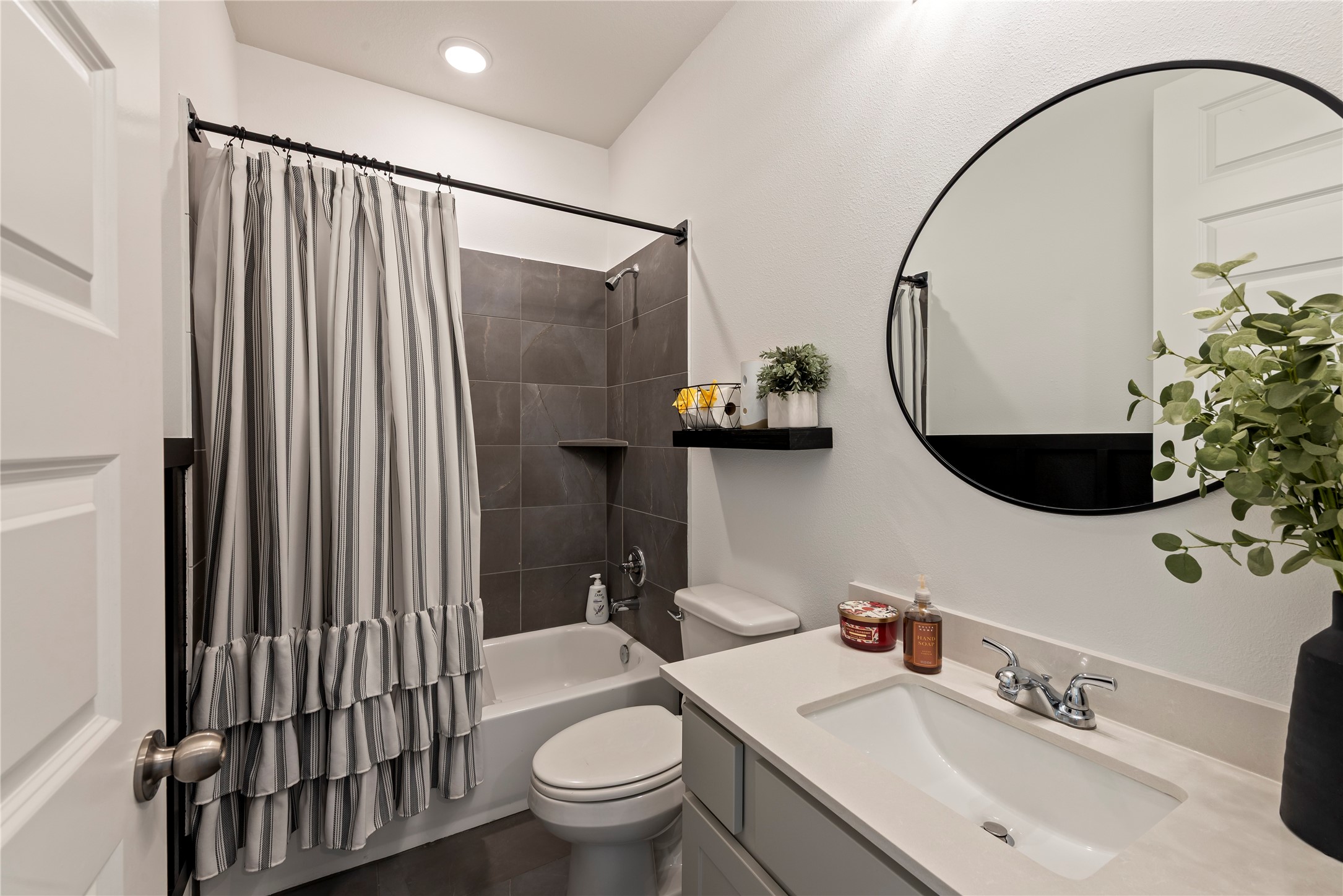 6034 Lake Bridge Lane Manvel, TX 77578 - Photo 19 of 33 a bathroom with a sink toilet and shower