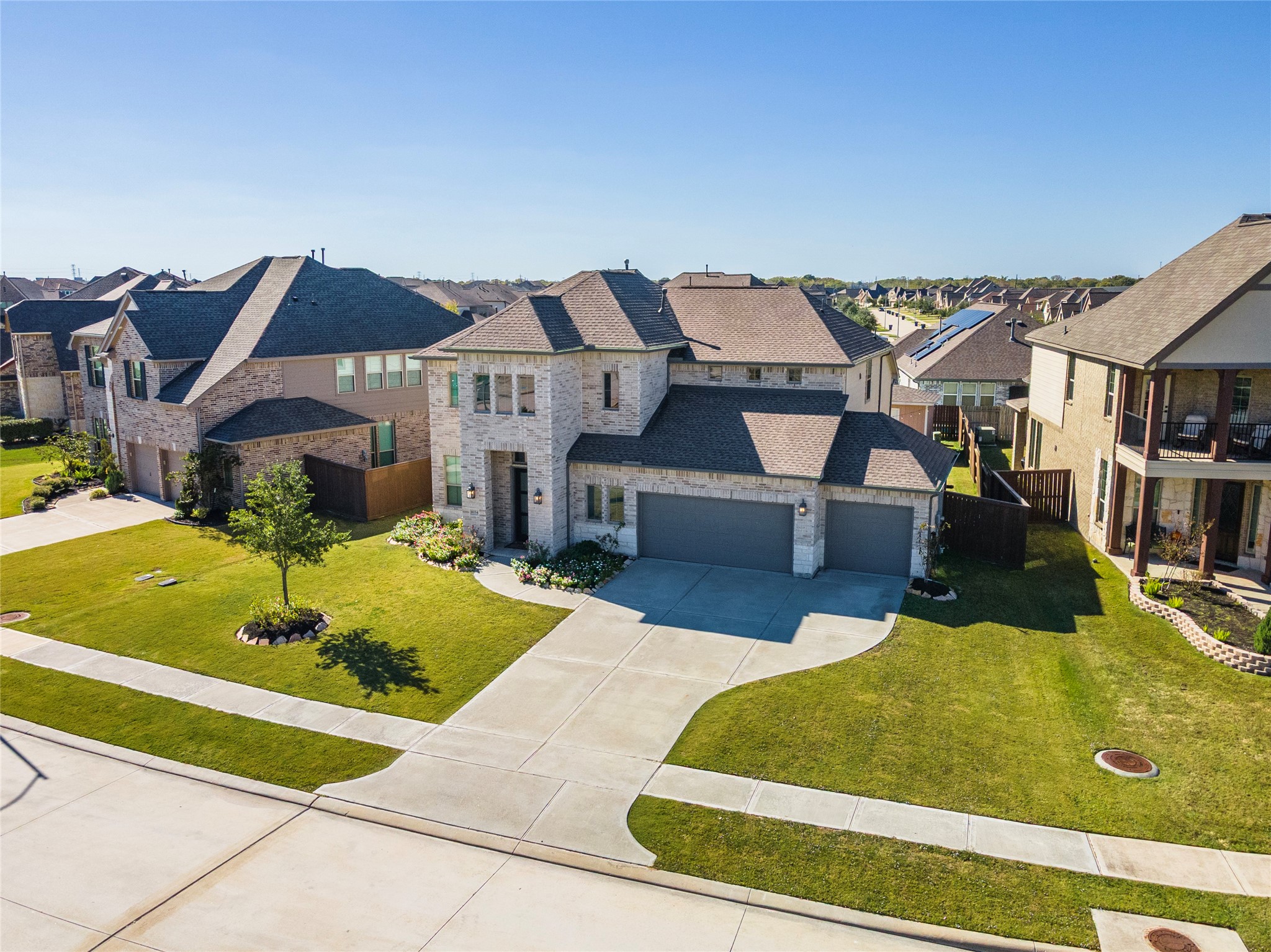 6034 Lake Bridge Lane Manvel, TX 77578 - Photo 29 of 33 a view of a house with swimming pool