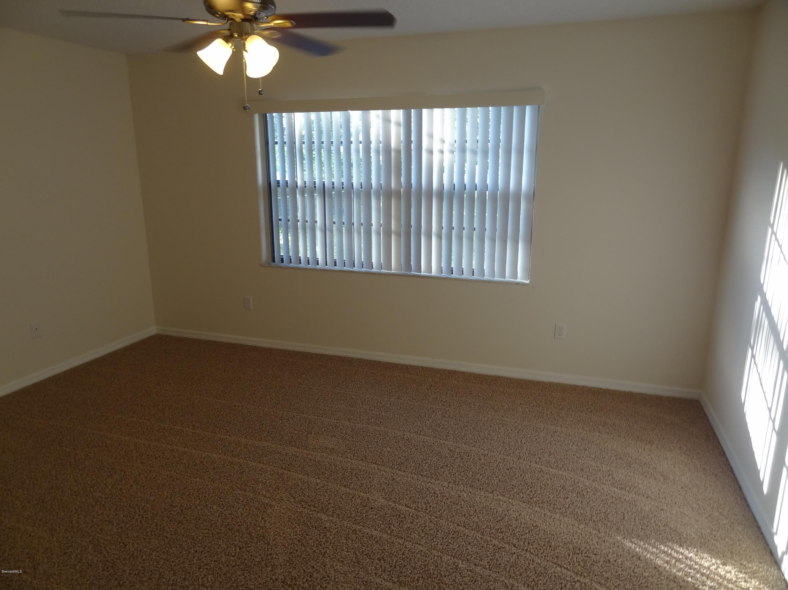 210 Wendover Road Southwest Palm Bay, FL 32908 - Photo 7 of 14 Master Bedroom