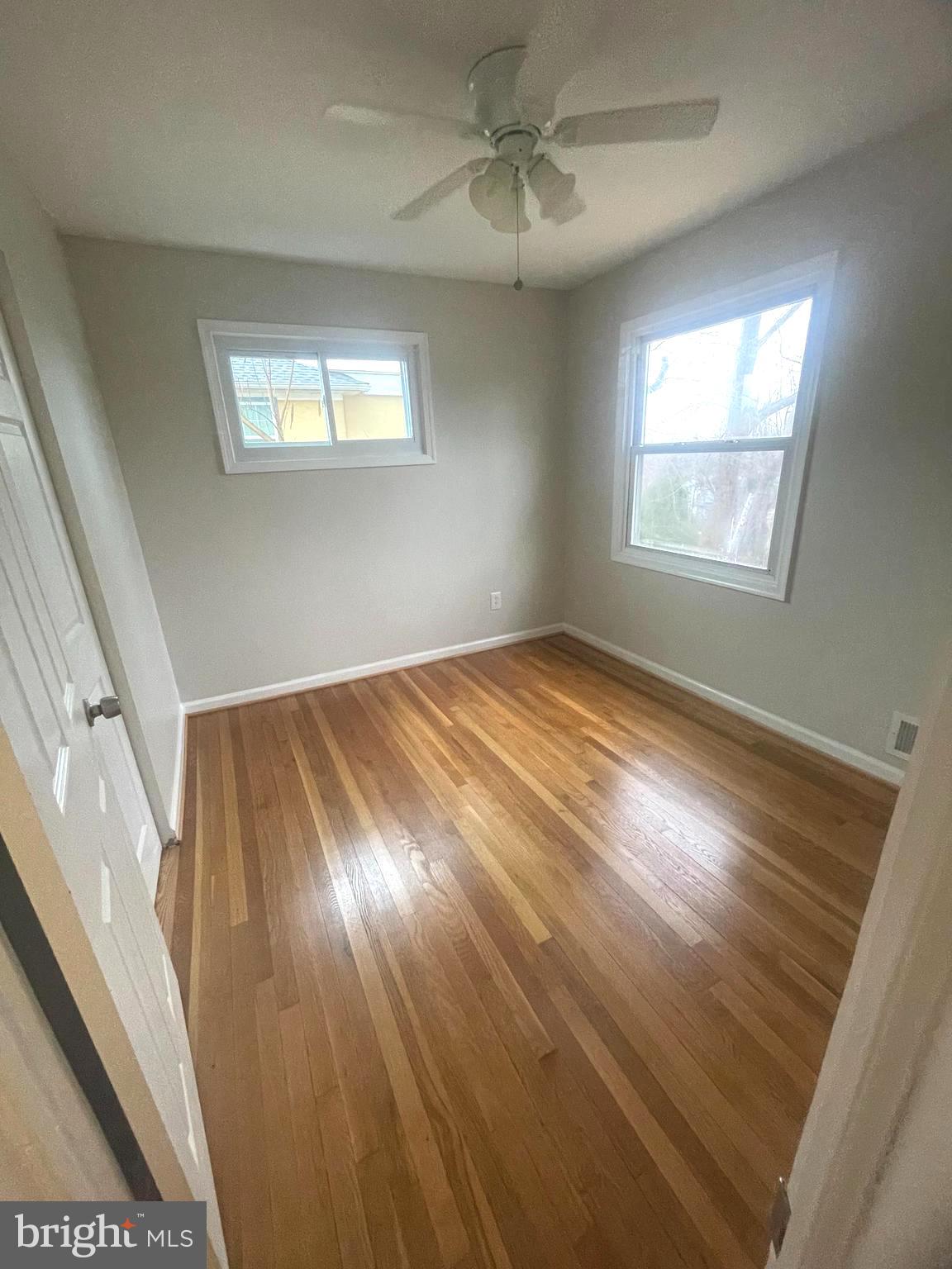 12120 Centerhill Street Silver Spring, MD 20902 - Photo 26 of 31 Second bedroom with hardwood floors.