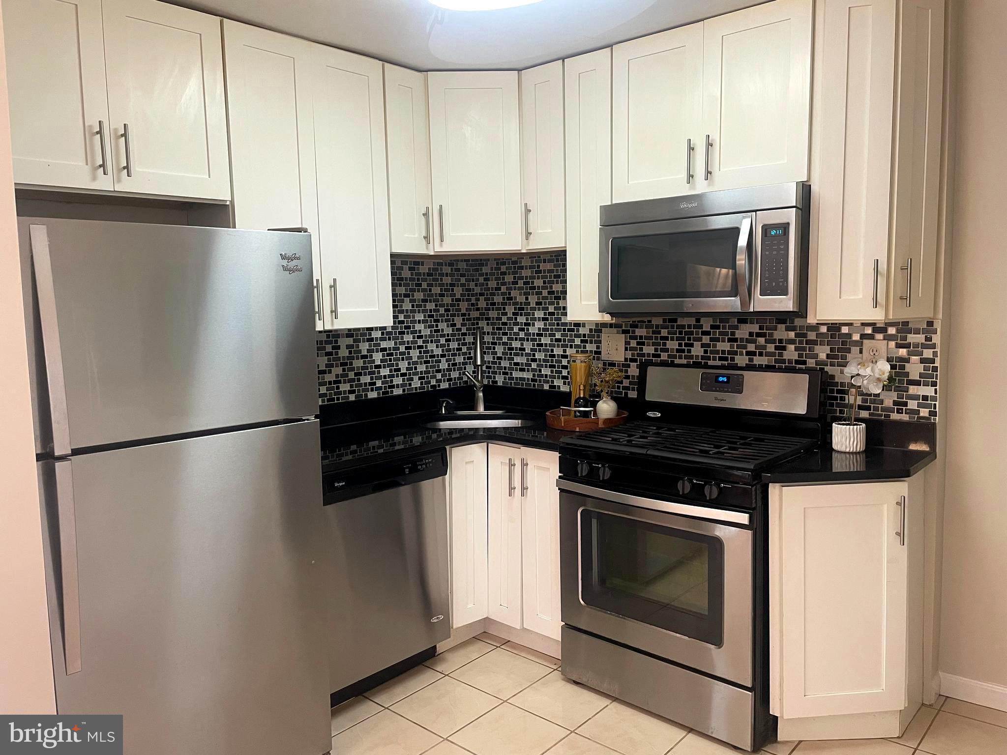 12120 Centerhill Street Silver Spring, MD 20902 - Photo 8 of 31 Kitchen renovated in 2016, stainless, granite, etc