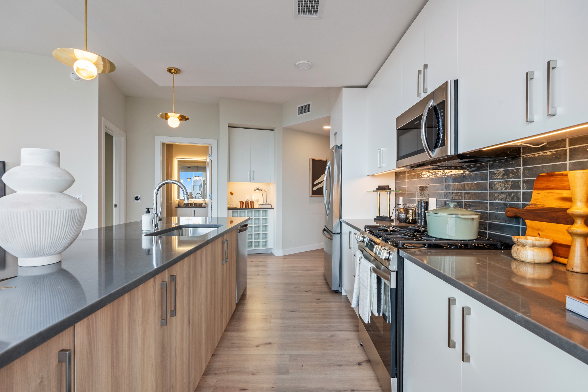 1212 Demonbreun Street, Unit B3 (Y) Nashville, TN 37203 - Photo 4 of 34 a kitchen with stainless steel appliances granite countertop a sink and a stove