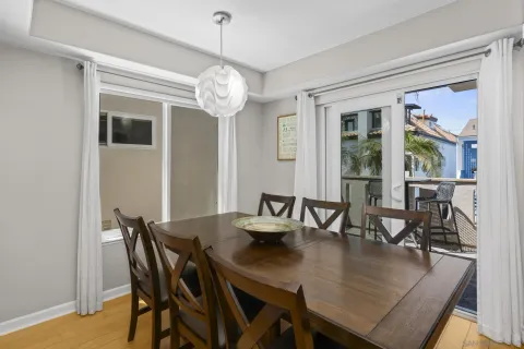 a view of a chairs and table in patio