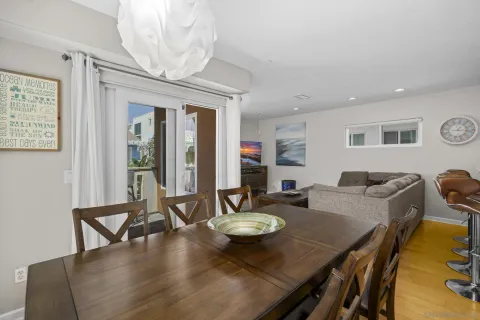 a view of a chair and table in the balcony