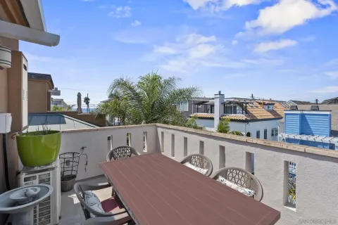 a bathroom with double sink and a mirror