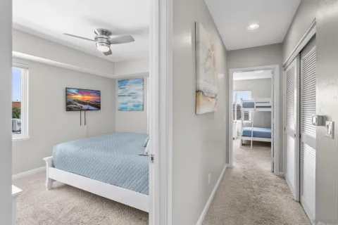 a living room with a large window and a table