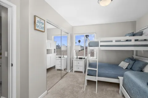 a front view of a house with parking space