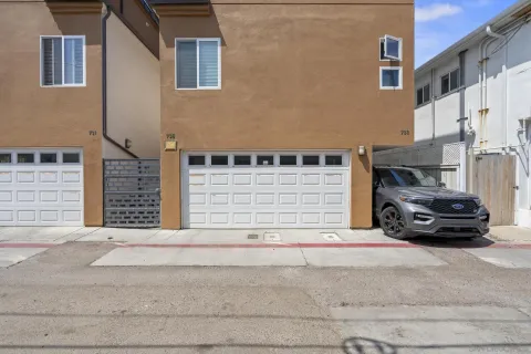 a view of city with ocean