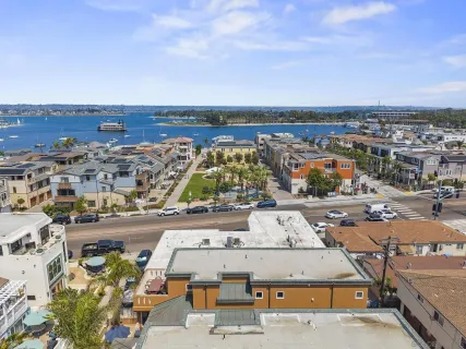 a view of a city with an ocean