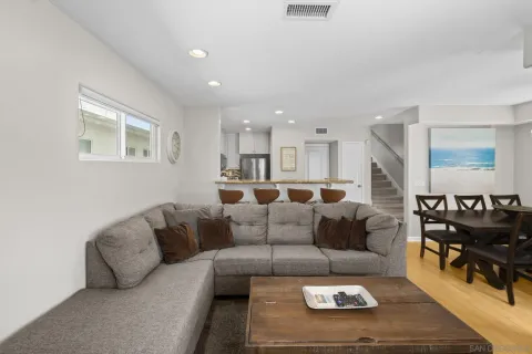 a kitchen with stainless steel appliances granite countertop a stove and a microwave