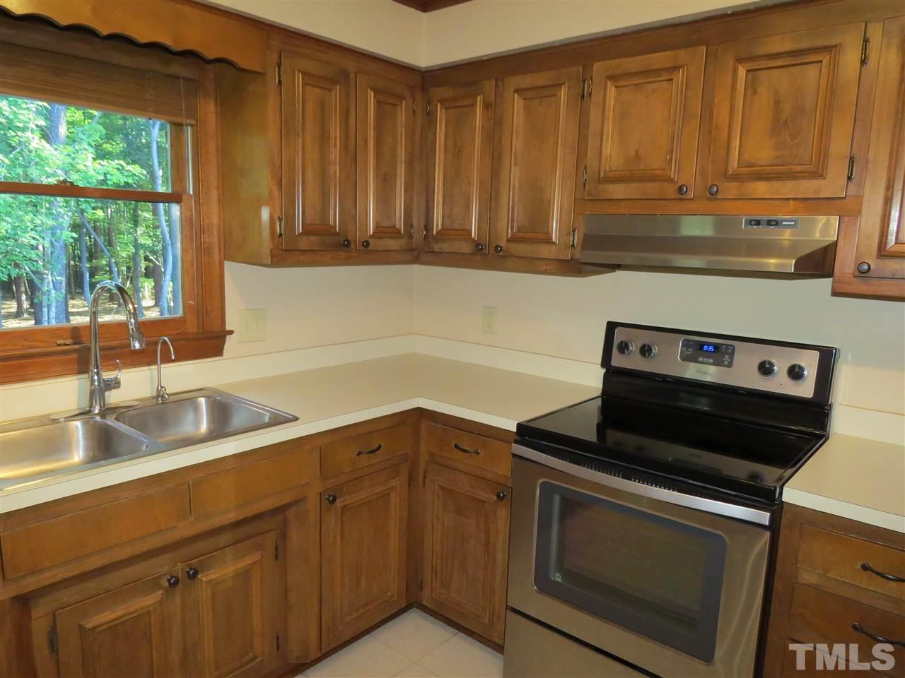 905 Skinners Ridge Road Raleigh, NC 27614 - Photo 5 of 21 a kitchen with granite countertop cabinets stainless steel appliances and a sink