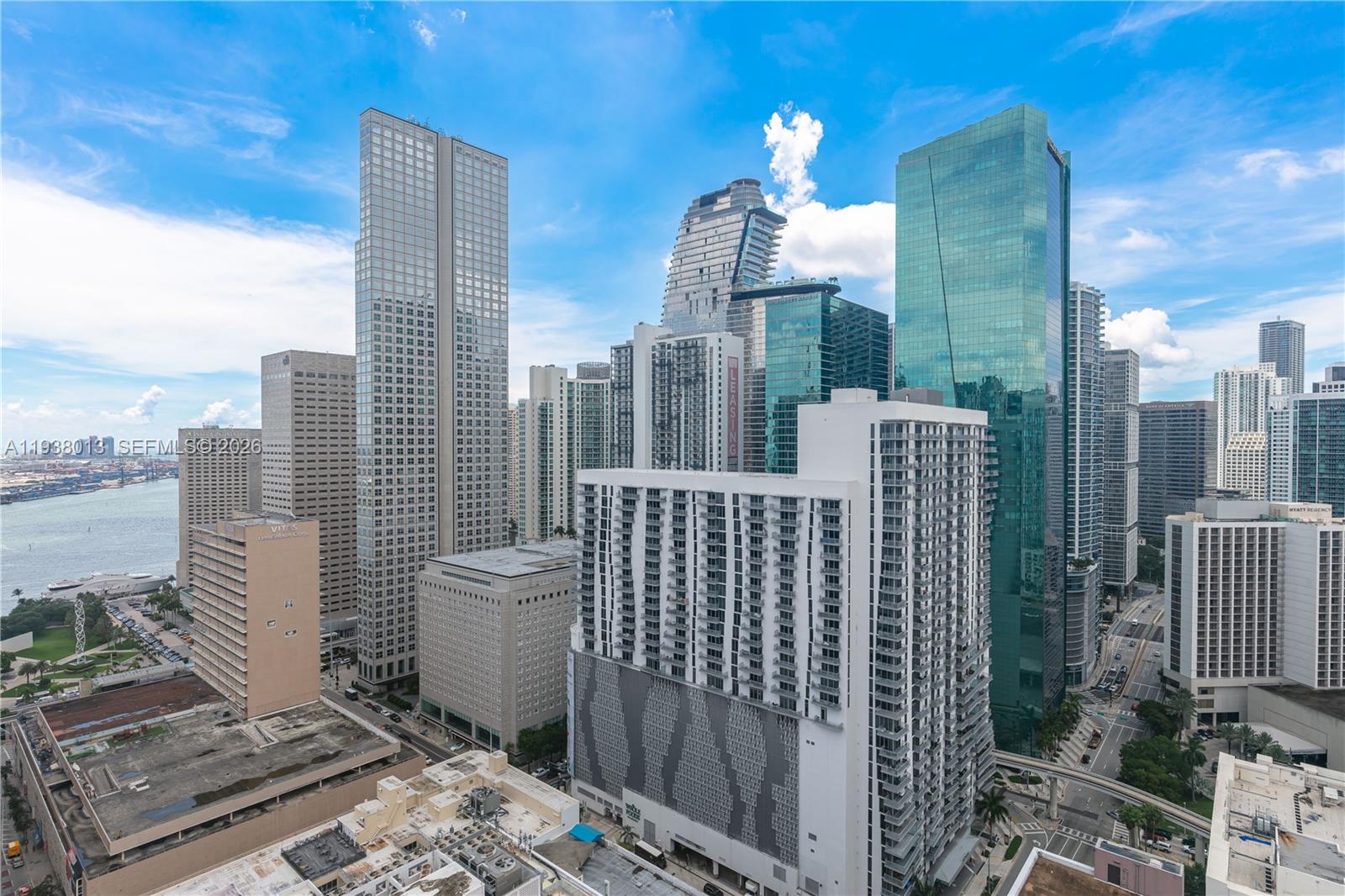 151 Southeast 1st Street, Unit 3103 Miami, FL 33131 - Photo 44 of 51 a view of a city from a balcony