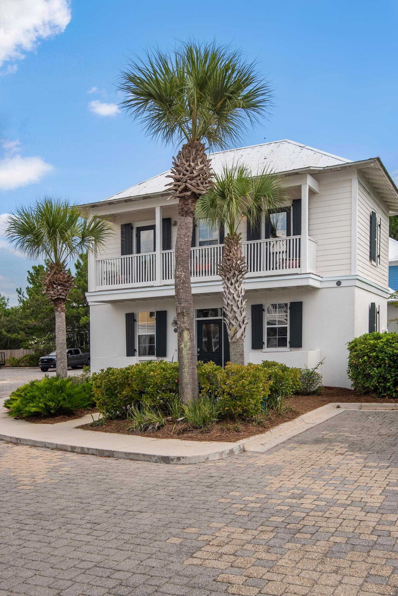 198 Somerset Bridge Road, Unit 155 Santa Rosa Beach, FL 32459 - Photo 2 of 22 a front view of house with yard and trees around