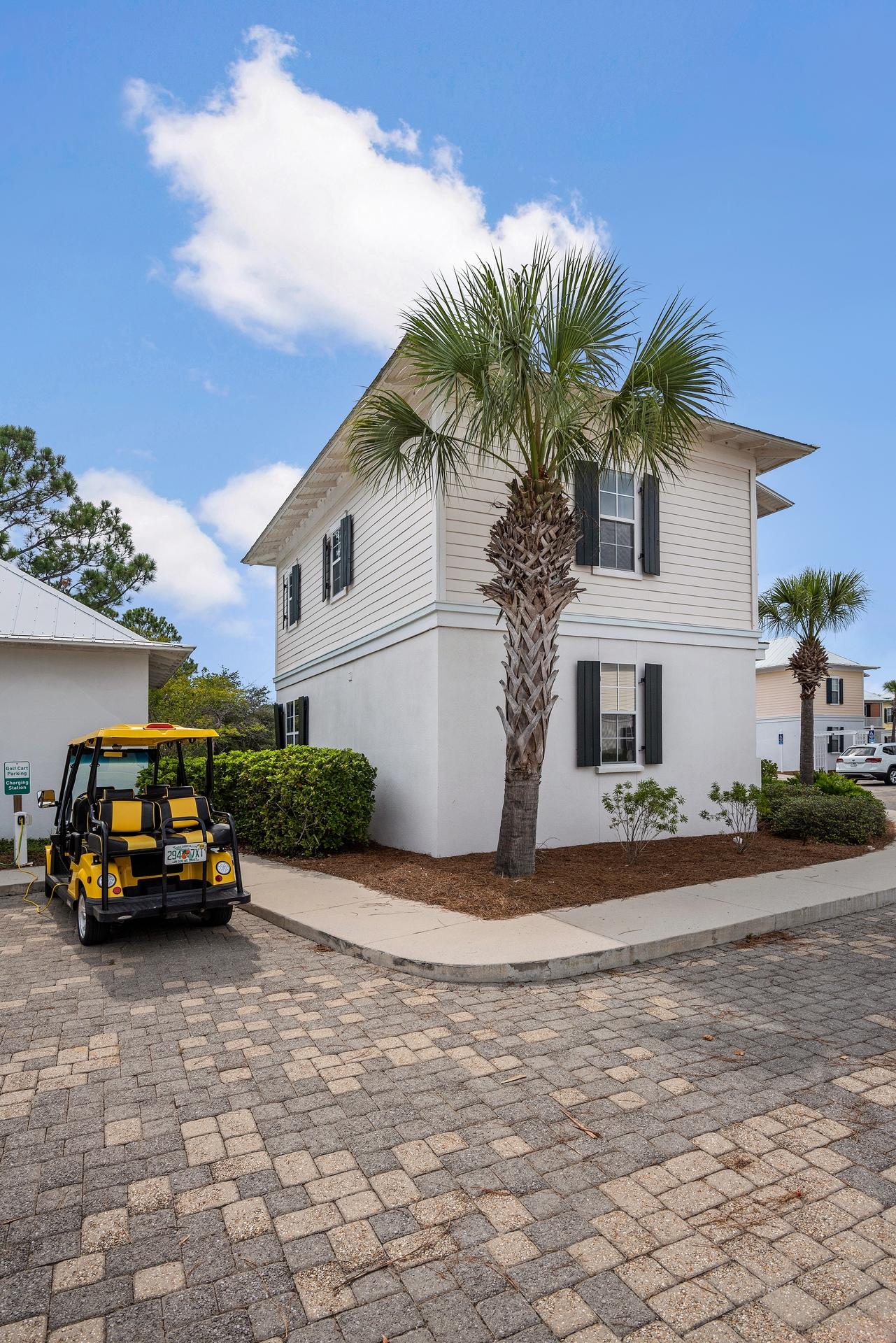 198 Somerset Bridge Road, Unit 155 Santa Rosa Beach, FL 32459 - Photo 3 of 22 a car parked in front of white house