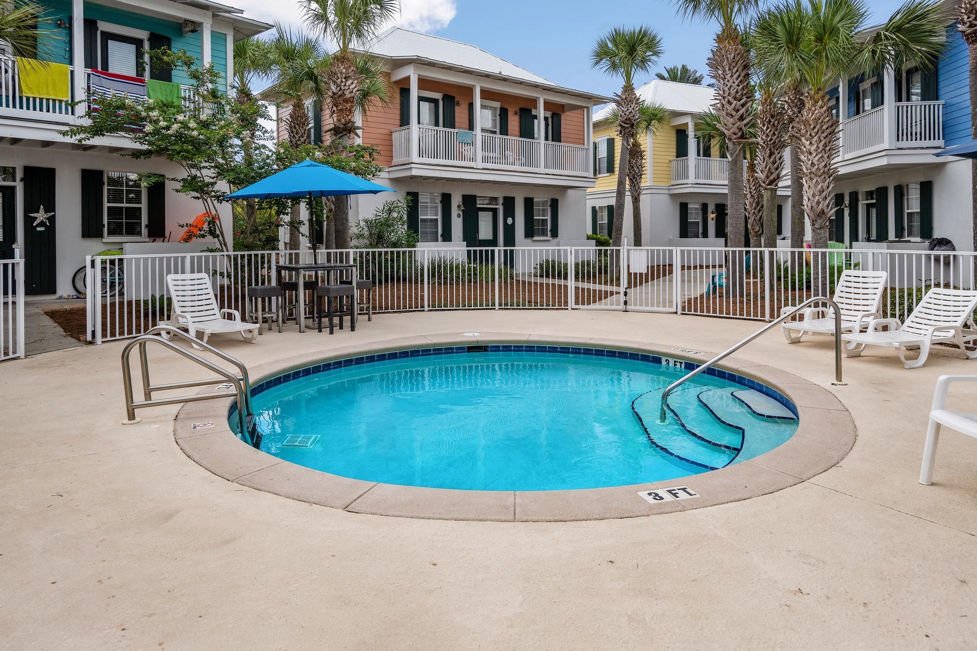 198 Somerset Bridge Road, Unit 155 Santa Rosa Beach, FL 32459 - Photo 22 of 22 a view of a house with swimming pool and sitting area