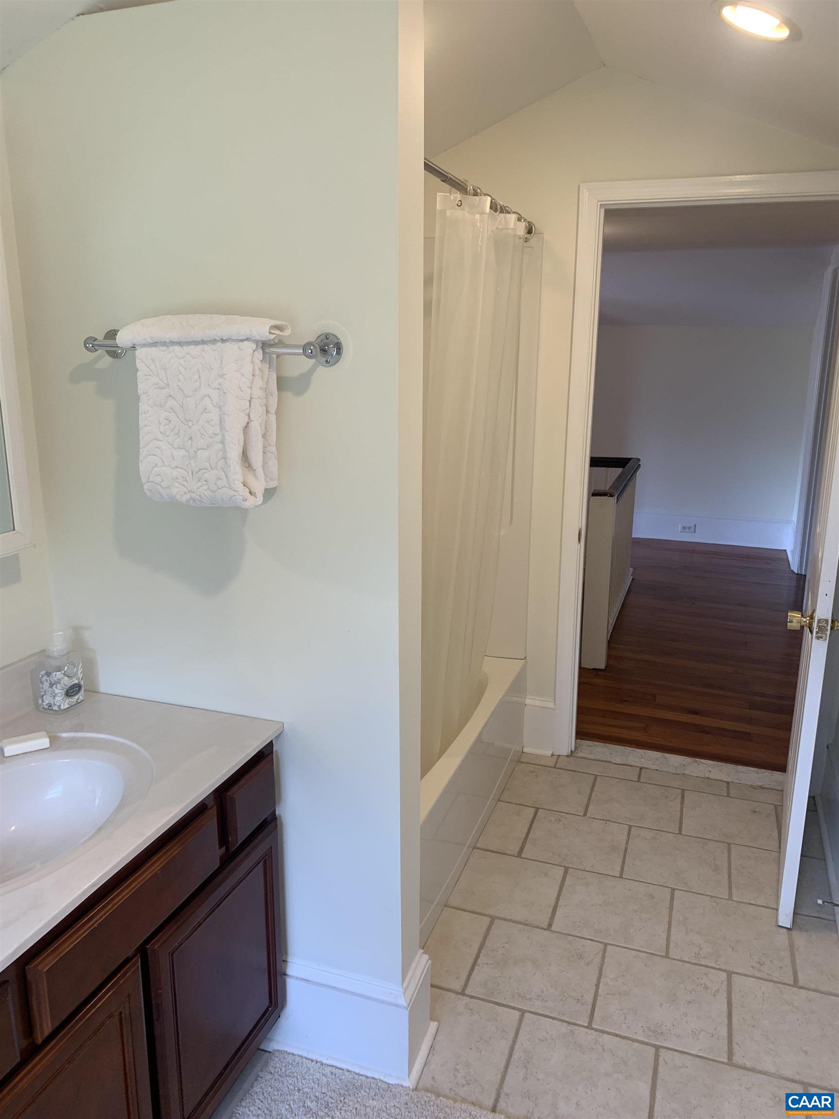 191 Barbour Street Orange, VA 22960 - Photo 15 of 19 a bathroom with a sink and a mirror