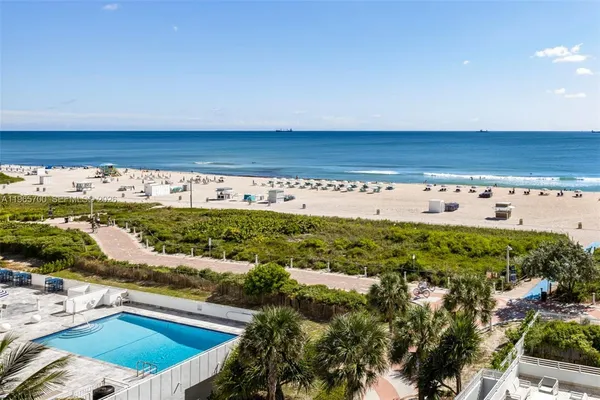 a view of outdoor space with swimming pool and outdoor space