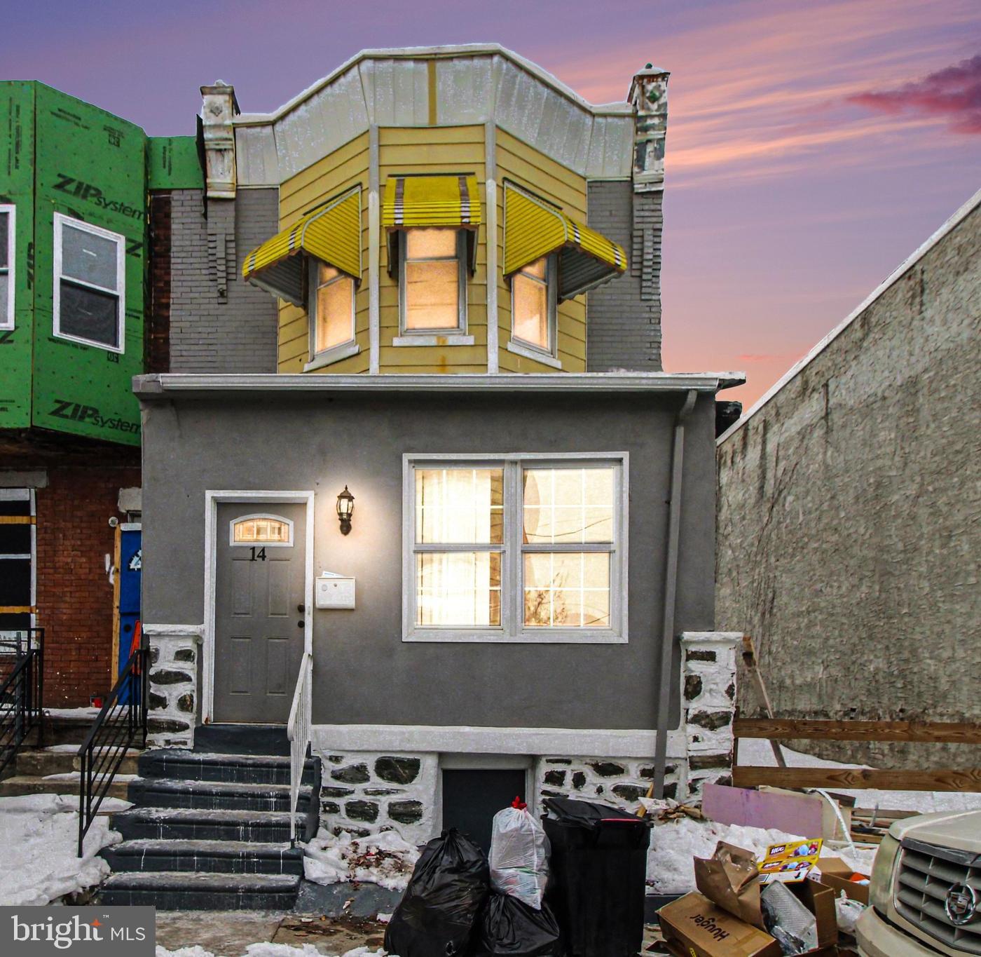 a front view of a house with a outdoor