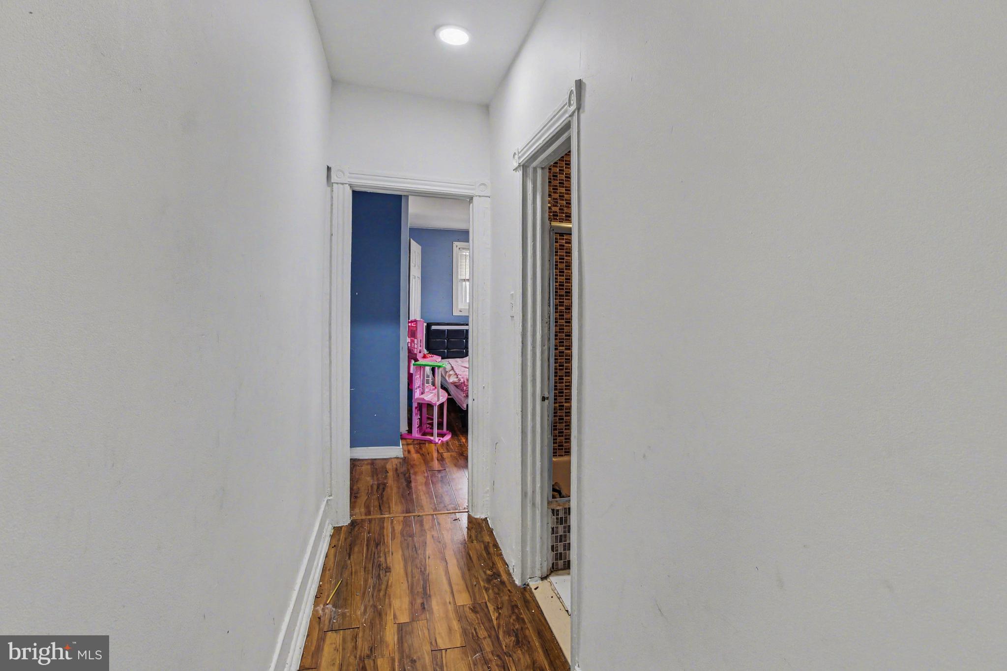 14 South Ruby Street Philadelphia, PA 19139 - Photo 12 of 28 a view of a hallway with wooden floor and entryway