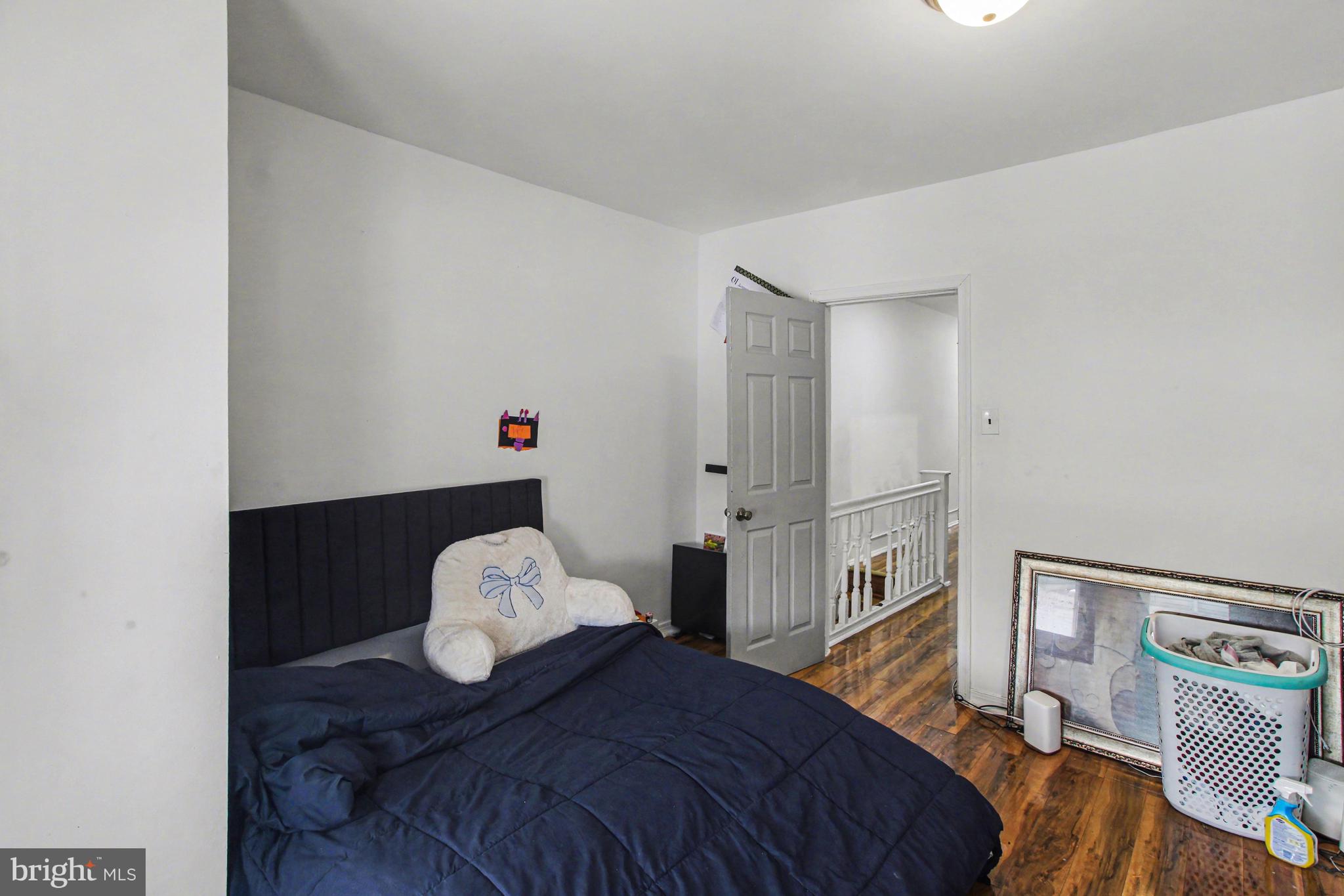 14 South Ruby Street Philadelphia, PA 19139 - Photo 14 of 28 a bedroom with a bed and a window