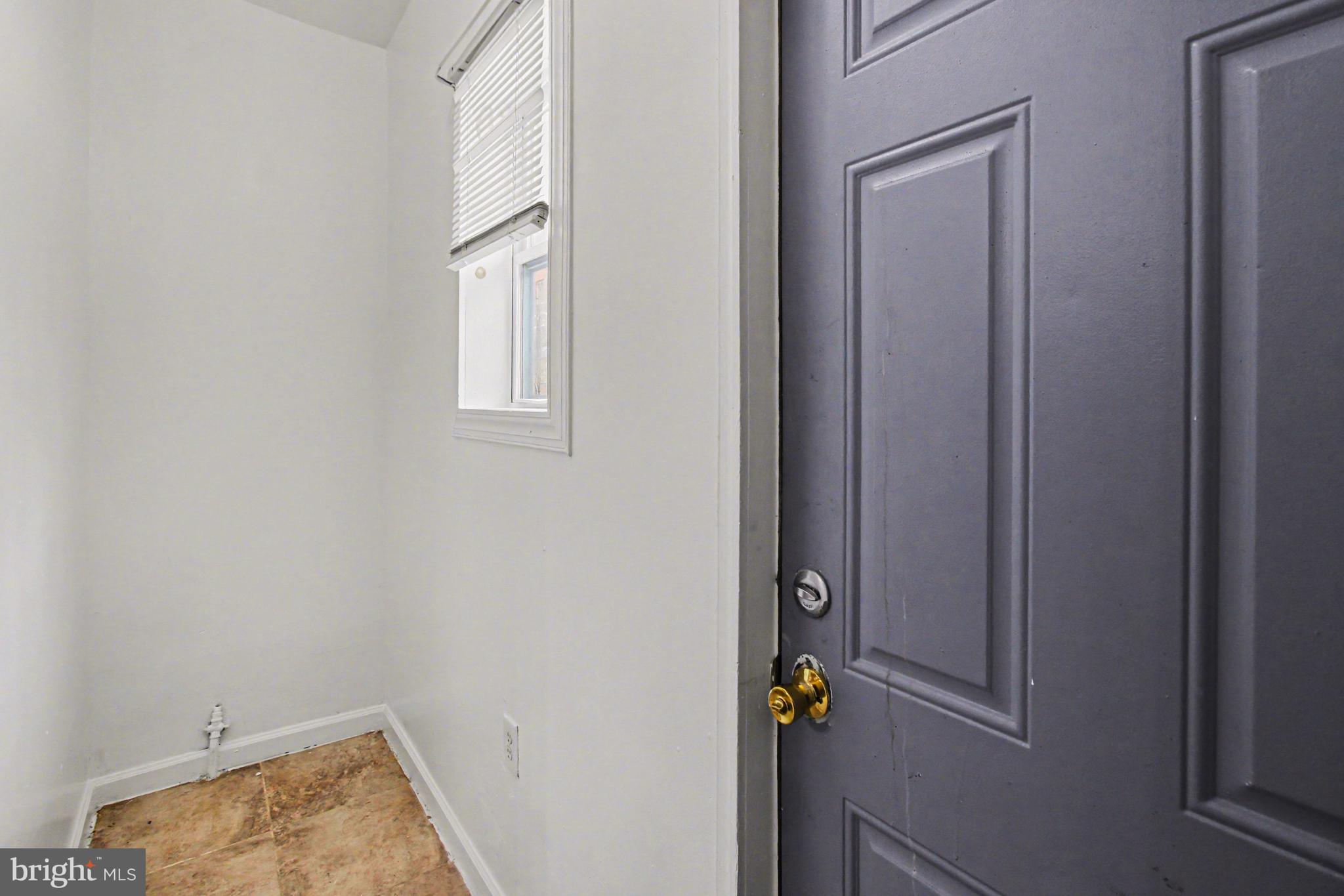 14 South Ruby Street Philadelphia, PA 19139 - Photo 22 of 28 a bathroom with a vanity and a window