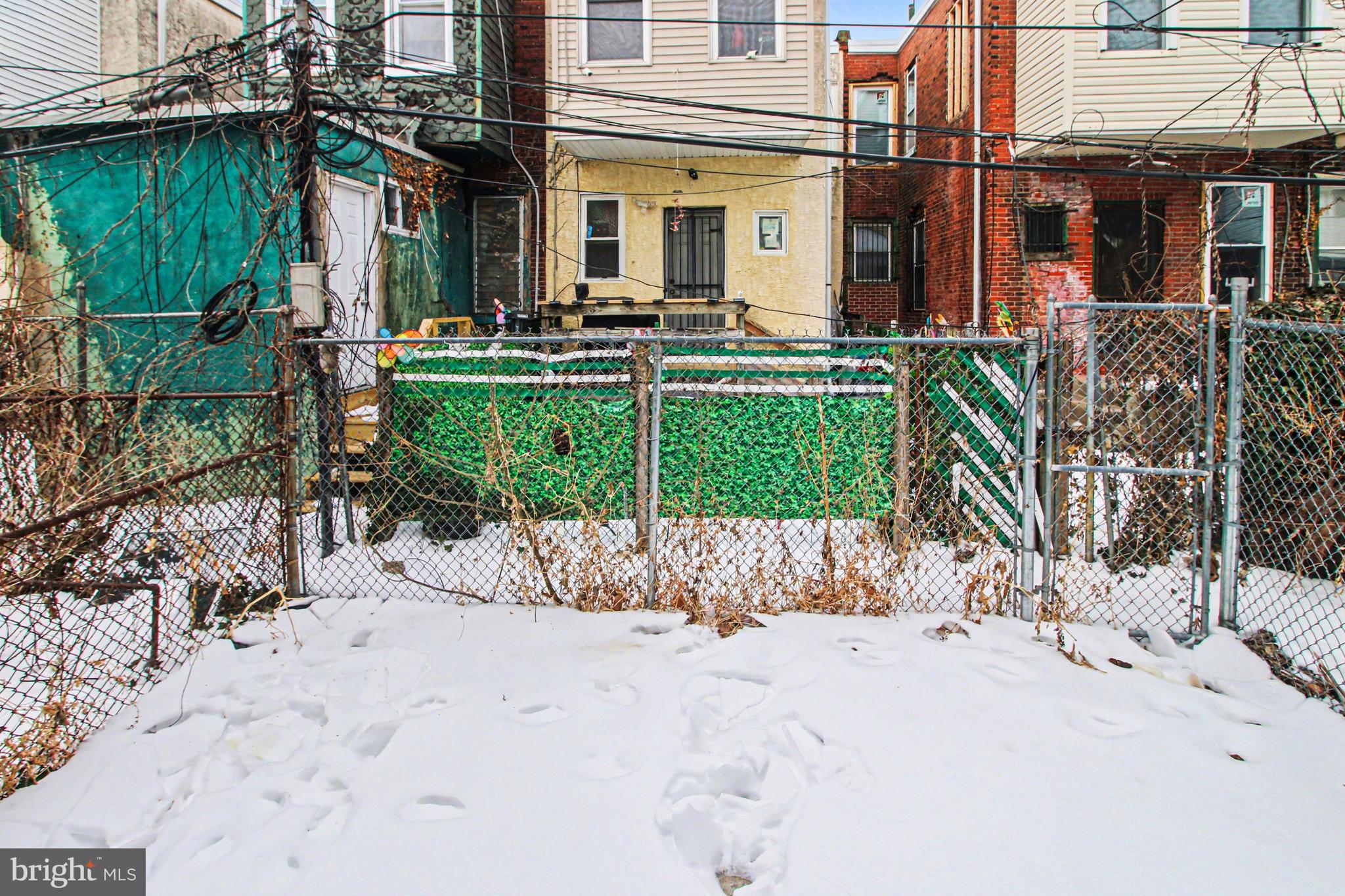 14 South Ruby Street Philadelphia, PA 19139 - Photo 23 of 28 a view of a house with a yard and sitting area