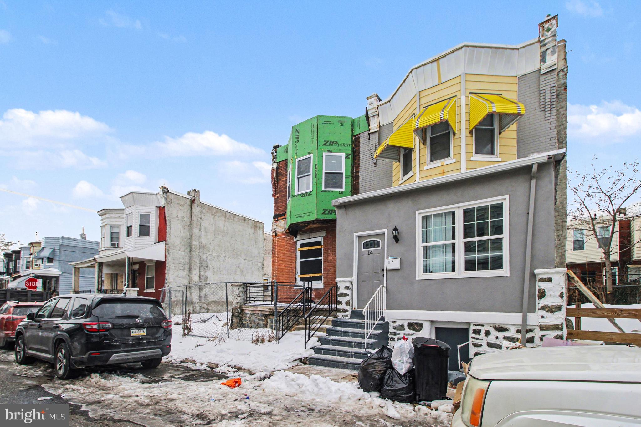 14 South Ruby Street Philadelphia, PA 19139 - Photo 3 of 28 a view of a building with cars park