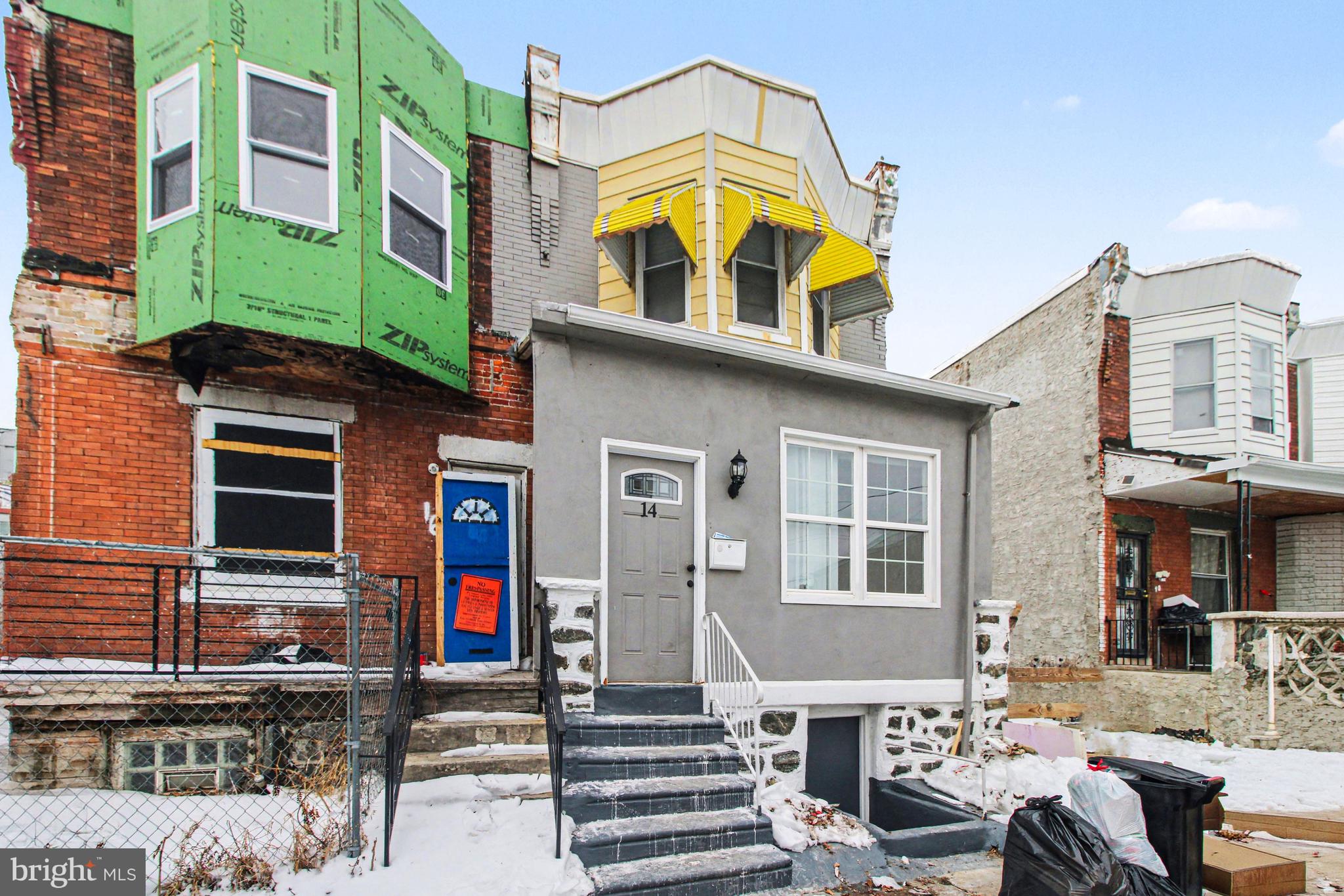 14 South Ruby Street Philadelphia, PA 19139 - Photo 4 of 28 a view of a brick building with many windows