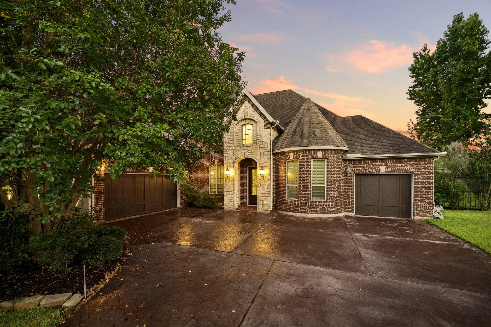 35 North Fremont Ridge Loop Spring, TX 77389 - Photo 33 of 37 Crafted by acclaimed builder Toll Brothers, this elegant residence showcases distinctive architectural details, a spacious stamped concrete driveway, and a grand arrival experience that reflects quality and sophistication.