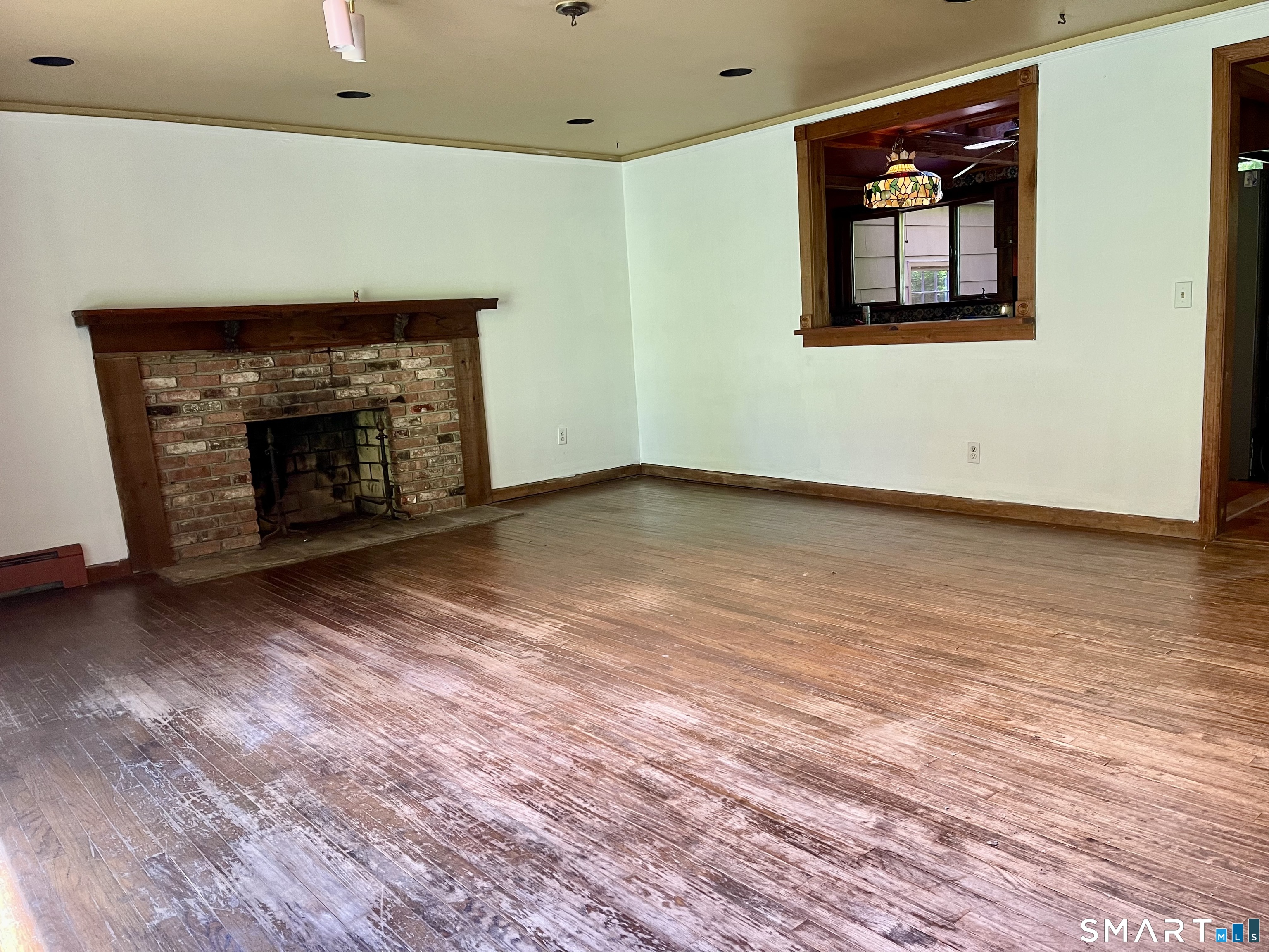 11 Tubbs Spring Drive Weston, CT 06883 - Photo 6 of 36 Grand entry living room enjoys a fireplace