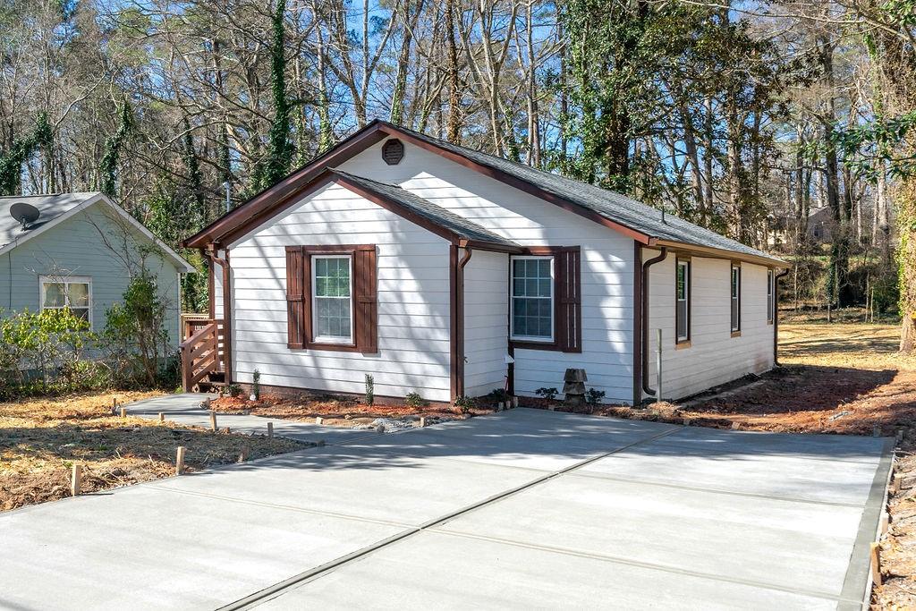 a front view of a house with yard