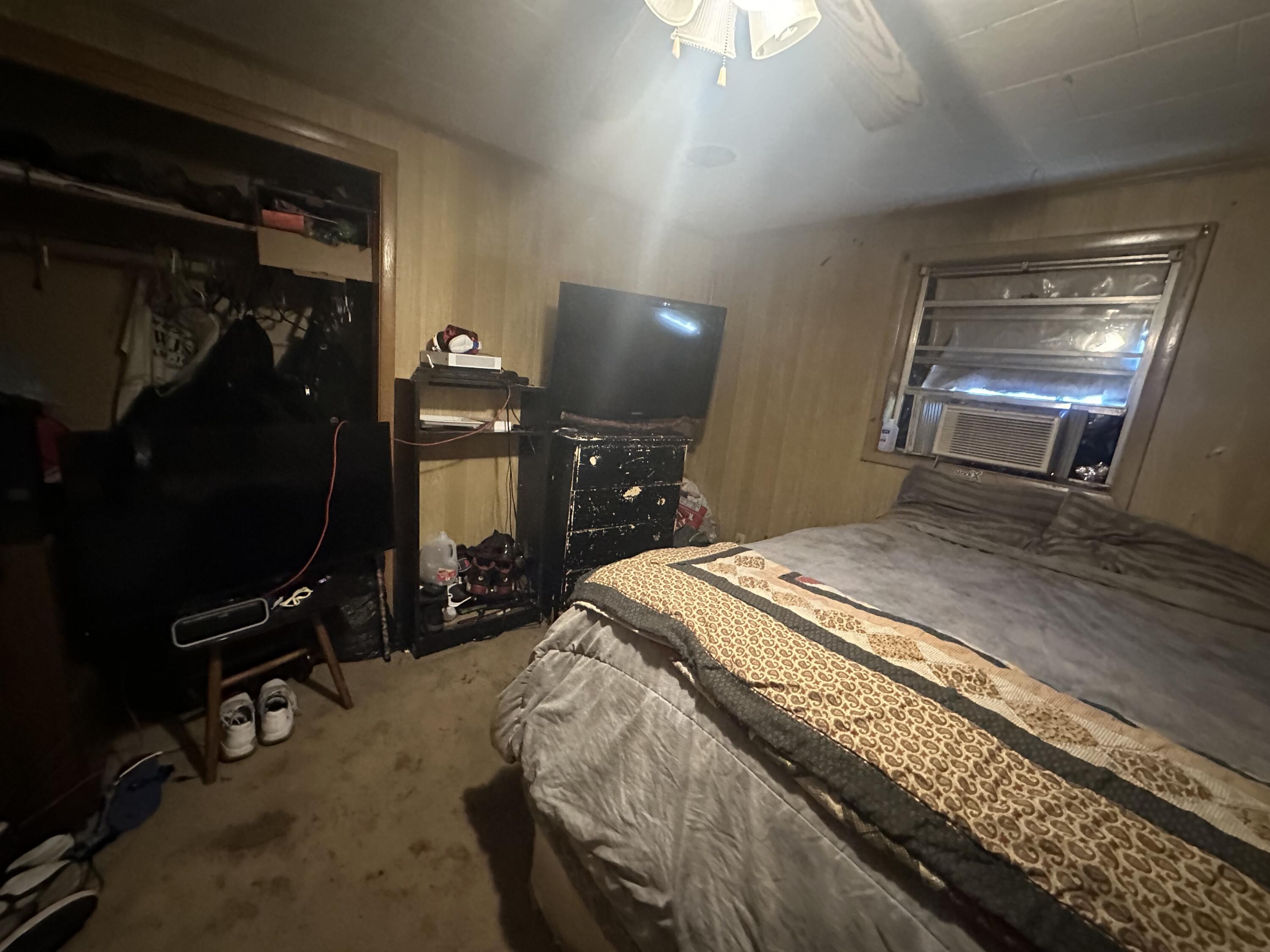 742 Kit Drive Crestview, FL 32536 - Photo 4 of 5 a bedroom with a bed and a gym machine