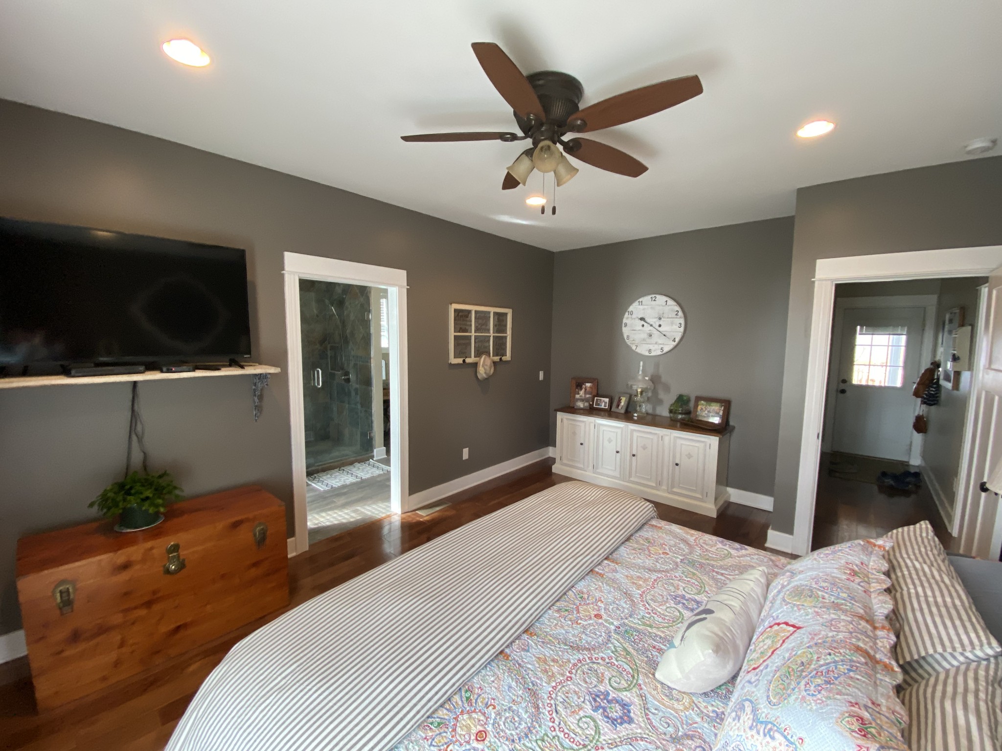 445 Moore Link Road Portland, TN 37148 - Photo 11 of 30 a bedroom with a bed and a chandelier