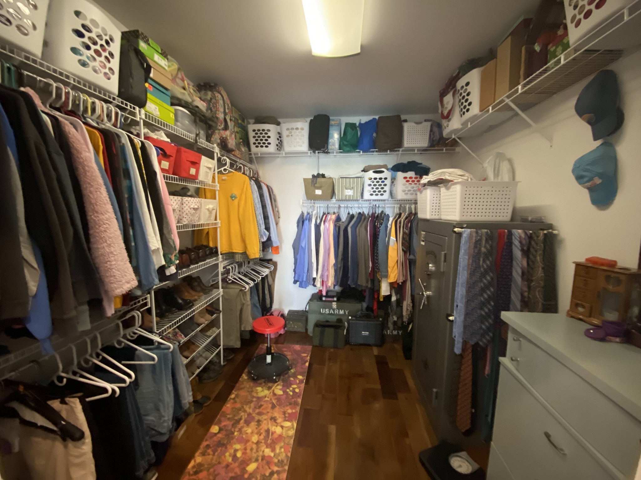445 Moore Link Road Portland, TN 37148 - Photo 15 of 30 a view of walk in closet with clothes and shoes