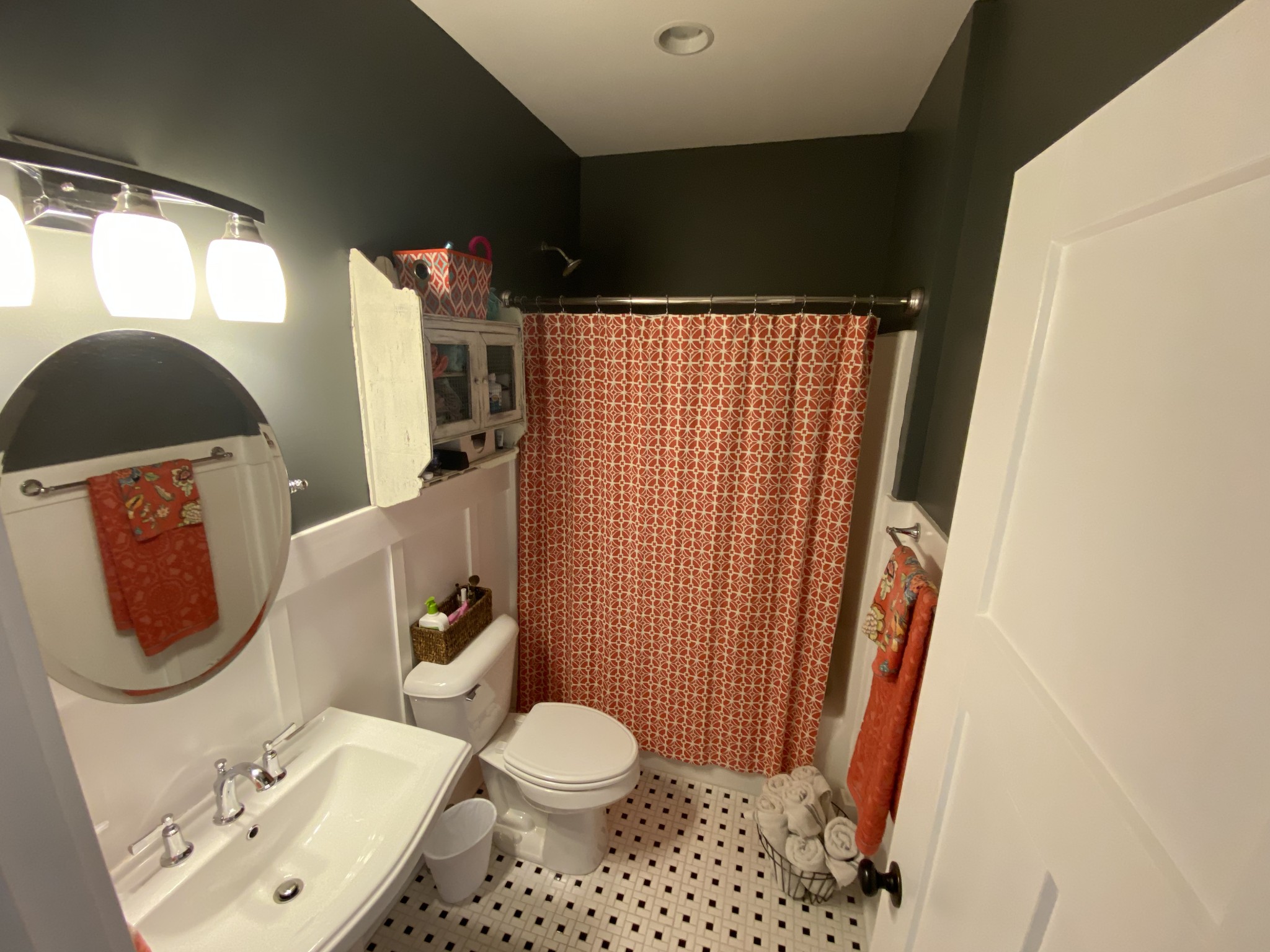 445 Moore Link Road Portland, TN 37148 - Photo 18 of 30 a bathroom with a toilet and a mirror